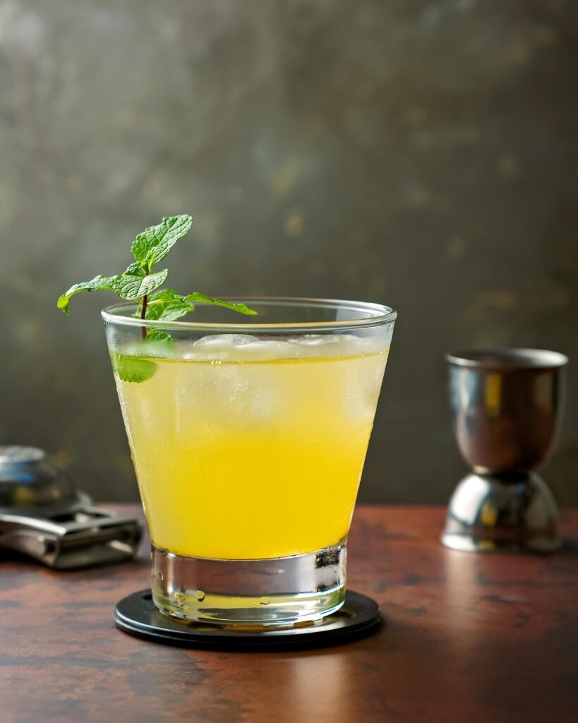 pexels photo 16335884 16335884 Chilled yellow lemonade with mint leaves and ice cubes for a refreshing summer drink.